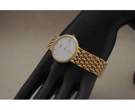 A gilt Longines gentleman's wristwatch with chain mail strap, from the Flag Ship Range.