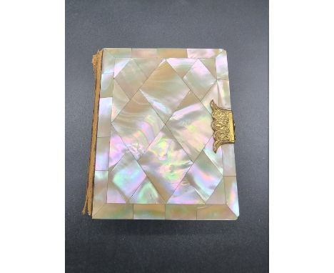 CARTE DE VISITE:&nbsp;a small format cdv album, calf backed mother of pearl boards with engraved brass clasp, aeg, containing