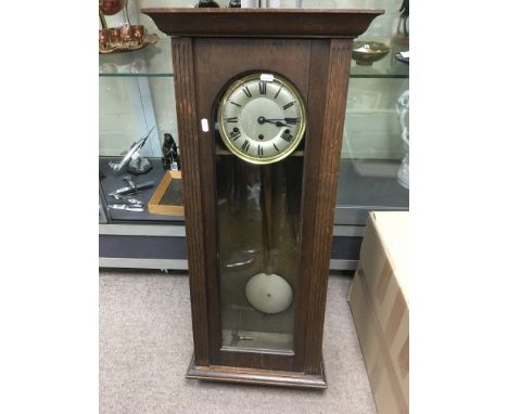 A mahogany cased wall clock.
