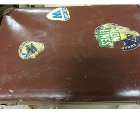 Three vintage suitcases