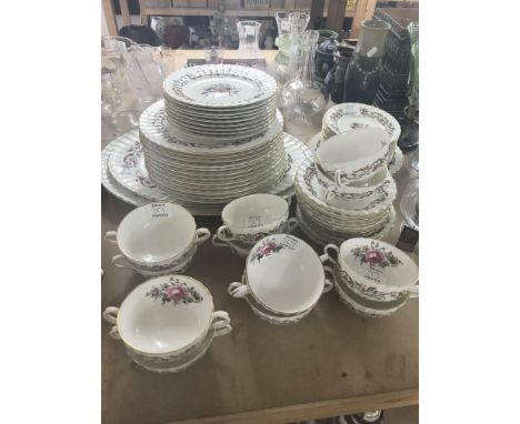 A royal Worcester dinner service Bournemouth including including twin handled bowls dinner plates and meat plates