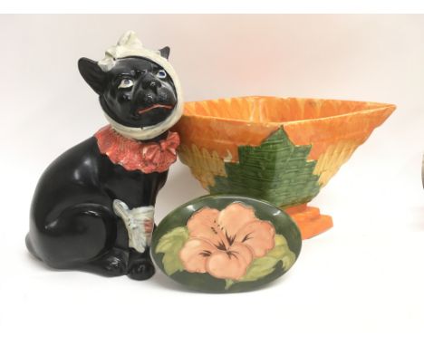 A small Moorcroft oval pin dish decorated with a red flower alongside an interesting and brightly painted English diamond sha