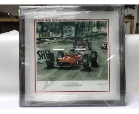 A framed and glazed autographed limited edition print of John Surtee's leading the 1966 Monaco Grand Prix also signed by the 