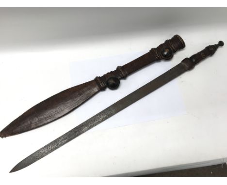 A Sudanese Kaskara sword and scabbard circa 1870-1880. Total length approx 96cm