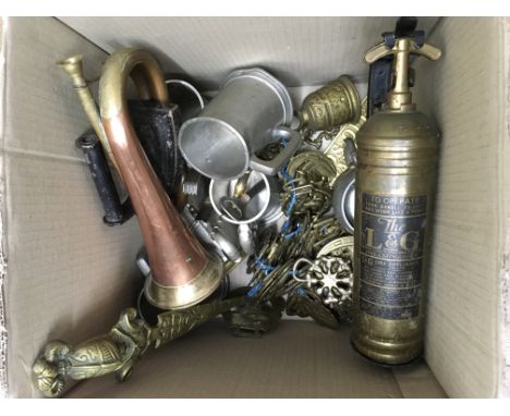 A box of odds including a bugle and  horse brasses