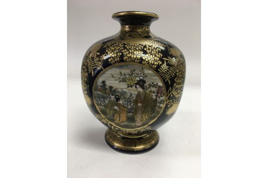 A Satsuma Vase Decorated With Four Hand Painted Panels And
