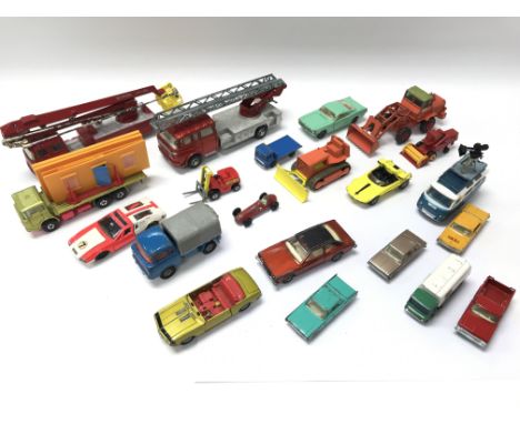 A collection of playworn Dinky and Matchbox cars with a Simon Snorkel fire engine.