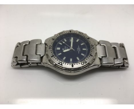 An Oskar Emil wristwatch with blue dial having baton numerals and date aperture.