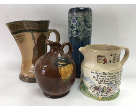 Two Doulton caricature jugs, Doulton vase and a Widecombe fair ceramic jug.