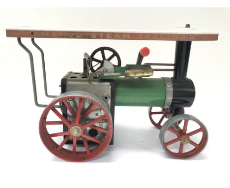 An unboxed Mamod steam engine.