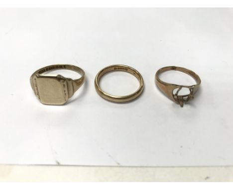 A collection of 3 9ct gold rings. Weight approx 6.7g, size R, K & M