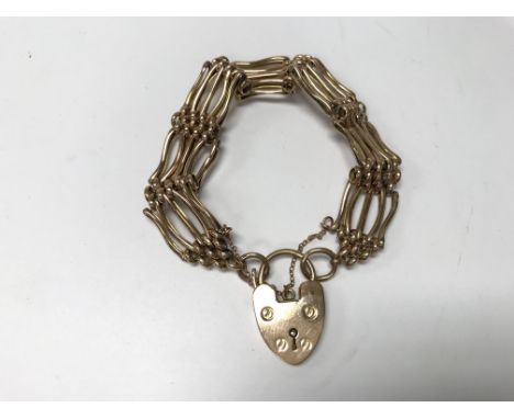 A 9ct gold gate bracelet. Weight approx 16.4g