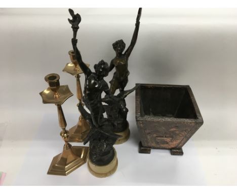 A pair of brass candlesticks, a pair of spelter figures plus a copper planter (5).