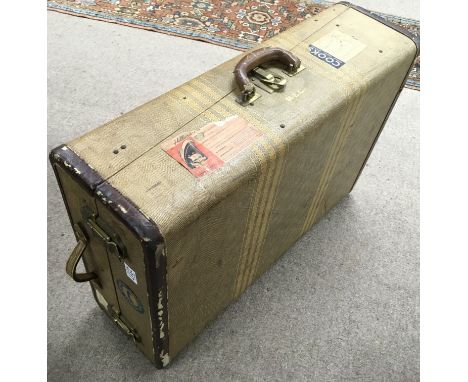 A vintage Hann travelling trunk with fitted interior and pull out hanger rail.Approx 50x77x23cm deep