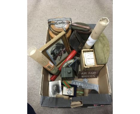 Abox of various WW2 military items including a Defence medal, Hom Guard information poster and an original sketch of a soldie