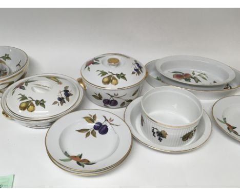 A collection of Royal Worcester Porcelain dinner ware, decorated with fruit.