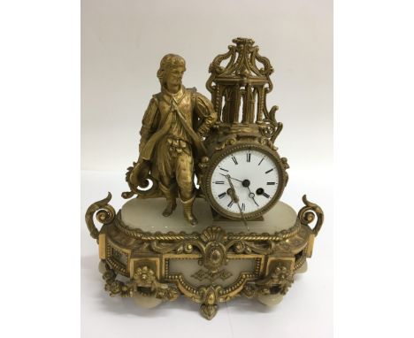 A French style gilt spelter mantle clock with enamel dial.Approx 36x34cm wide