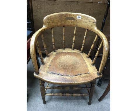 A bentwood chair with decorative seat panel