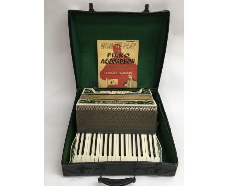 A cased accordion.