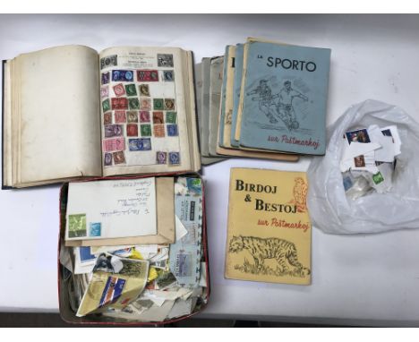 A collection of stamps including vintage world olympic stamps.