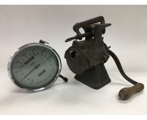 A Jaeger speedometer in KM/H and a vintage spong mincer (2).