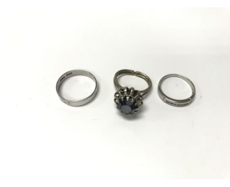 A 9ct white gold ring set with diamonds (weight approx 1.83g, size approx M) and two silver rings (Size approx K/S)