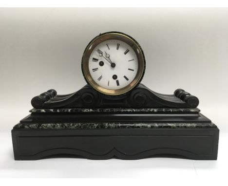 A Victorian marble mantle clock
