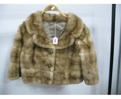 A Beige Mink Bolero Style Cocktail Jacket, the pelts laid horizontally, wide collar and elbow length sleeves, openwork gilt b