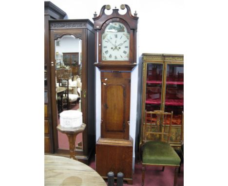 A Late XVIII/Early XIX Century Oak and Mahogany Eight-Day Longcase Clock, the hood with swan neck pediment, arched door to pa