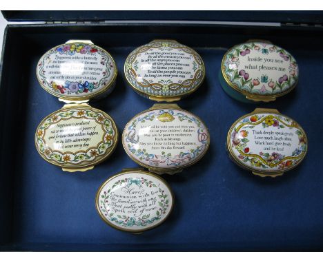 Six Halcyon Days Enamel Oval Trinket Boxes, each with proverb/motto to hinged lid, 5 x 4cm, another smaller example 4.5 x 3.5