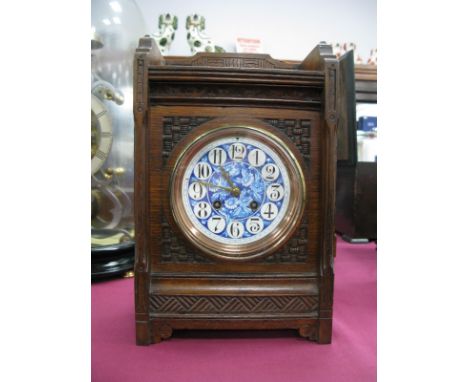 A Japy Freres and Co. Arts &amp; Crafts Style Oak Cased Mantle Clock, carved with basketweave, crosshatch and flowerheads, th