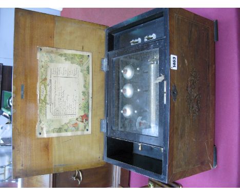 A Mid XIX Century Twelve Air Musical Box, in walnut inlaid case, steel comb, brass drum and three bells, printed tune sheet t