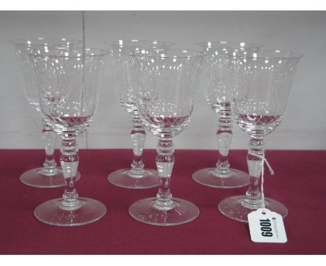 A Set of Six Pall Mall Crystal 'Lady Hamilton' Pattern Wine Glasses, the bowls with scroll and lattice etching, on inverted  