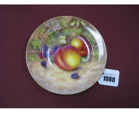 A Royal Worcester Porcelain Side Plate, painted by Freeman, signed, with ripening fruit against a mossy woodland bank, black 