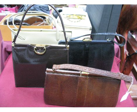 Four Mid XX Century Classic Style Handbags; Mappin &amp; Webb brown lizard and a similar handbag in black lizard, a Czarina b