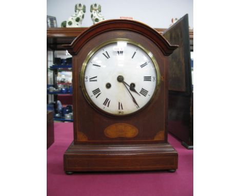 An Edwardian Mahogany Bracket Clock, with dome case, kidney and batwing decoration, stepped base, twin brass carry handles, e