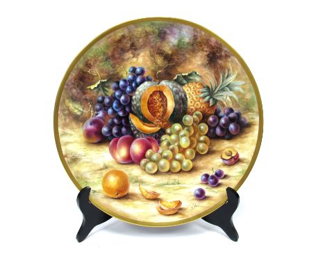 A Royal Worcester Porcelain Charger, of circular form, painted by Sally Ward, signed, with ripening fruit on a mossy woodland