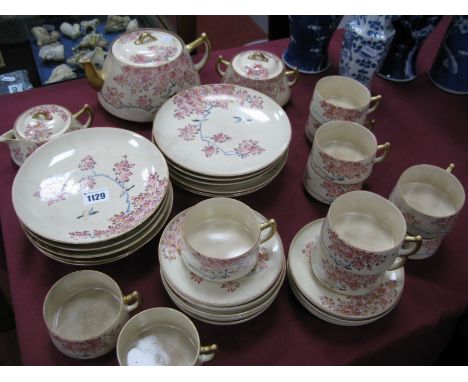 An Early XX Century Japanese Satsuma Tea Service, decorated with birds perched in pink blossom trees, signed, with gilt borde