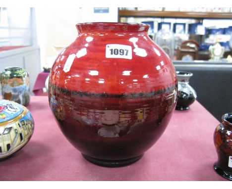 A Mid XX Century Moorcroft Pottery Flambé Vase, of globular form with mottled and shaded maroon glazes, impressed marks, 'Pot