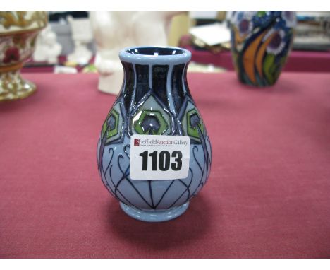 A Modern Moorcroft Pottery Vase, of ovoid form, painted in the 'Peacock Parade' pattern designed by Nicola Slaney, impressed 