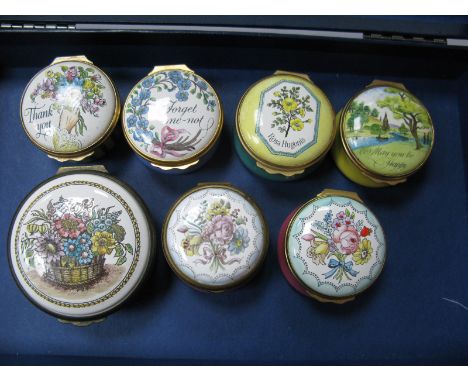 A Bilston &amp; Battersea Enamel Circular Trinket Pot, the lid decorated with a basket of flowers, 5.5cm diameter; Six Others