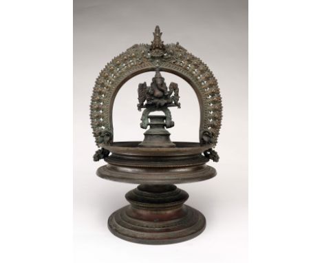BronzeIndia , 18th centuryDimensions: Height 36 cmWeight: 3735 gramsA large ritual vessel from India with a round foot, expan