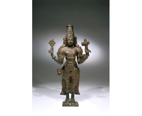BronzeSouth-India, 15th century or earlierDimensions: Height 29 cmWeight: 3117 gramsFour-armed Vishnu standing on a square fl