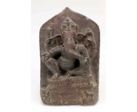 Black stoneIndia, 12th centuryDimensions: Height 23 cm by 15 cmWeight: 1850 gramsA black stone panel with Ganesha seated on a