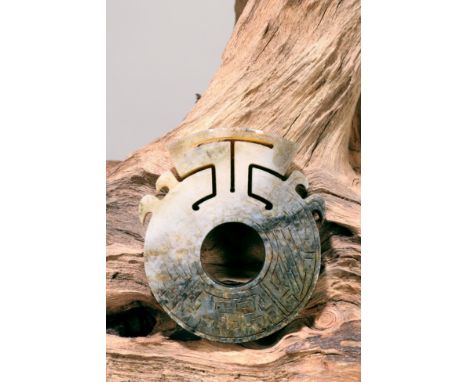 Hetian JadeChina, Qin Dynasty (221 B.C. -  206 B.C.)Dimensions: Diameter 6,5 cm Depth 0,7 cmWeight: 43 gramsSmall ring with o