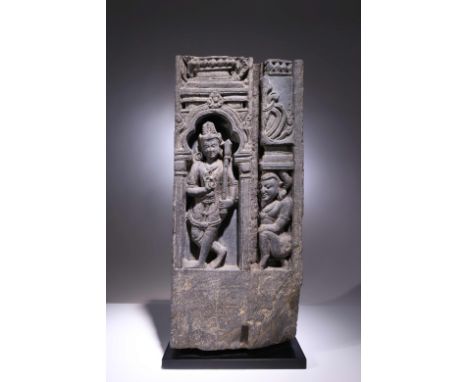 Black StoneIndia, 12th centuryDimensions: Height 48 cm by 23 cmWeight: 32522 gramsA rectangular stone panel with two frames, 