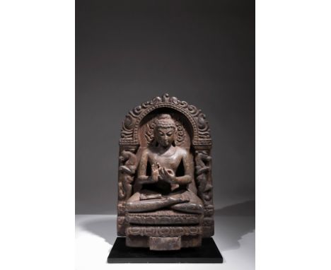 StoneIndia , Pala Style revival, 18th centuryDimensions: Height 30 cmWeight: 13.399 gramsA seated Buddha in lotus position on