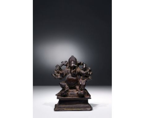 BronzeIndia, 15th to 16th centuryDimensions: Height 7,5 cm by 6 cmWeight: 223 gramsGanesha is also called "The Remover of Obs