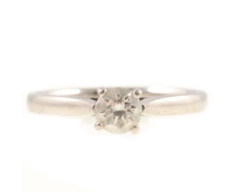 A diamond solitaire ring, the brilliant cut stone four claw set in a platinum mount, ring size P, Valuation for Insurance dat