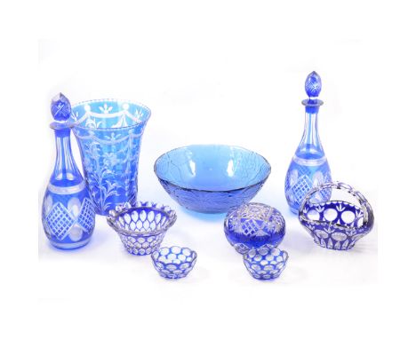 Collection of coloured glassware including a Bristol Blue rolling pin, Bavarian overlaid blue glass, polygonal mallet-shape d